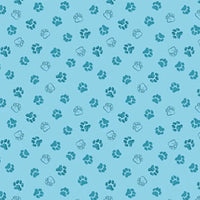 A Day in the Park Dog Paw Prints on Blue Fabric to sew - QuiltGirls®